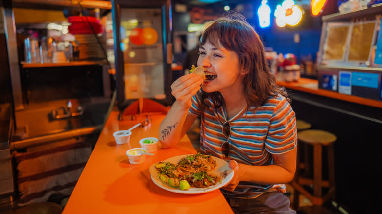 Person enjoying a meal