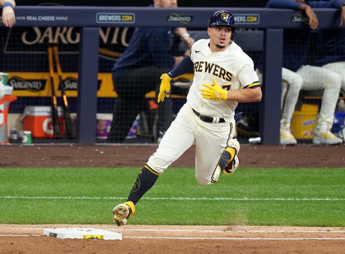 Brewers' Willy Adames exits game after being struck by a foul ball