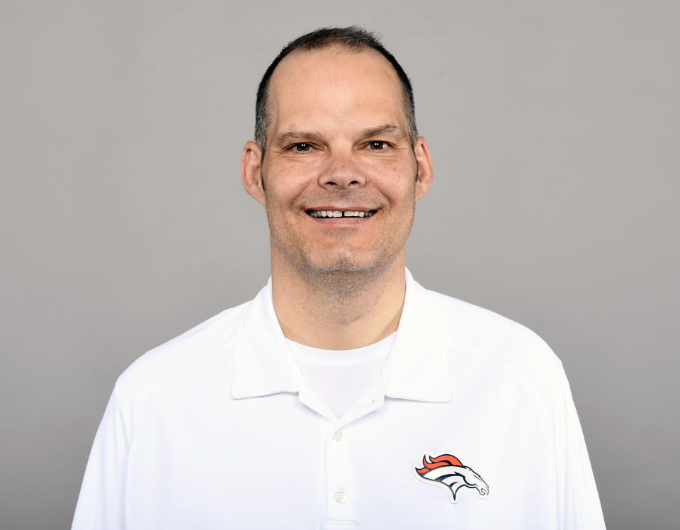 FILE - This is a 2016 file photo showing Tom Heckert of the Denver Broncos NFL football team. The Broncos say former personnel executive Tom Heckert died Sunday night, Aug. 5, 2018, following a long illness. Heckert, 51, stepped away from the Broncos after last season after being diagnosed in recent years with amyloidosis, a rare disease that causes a buildup of amyloid proteins in the heart, kidney, liver and other organs. (AP Photo/File)