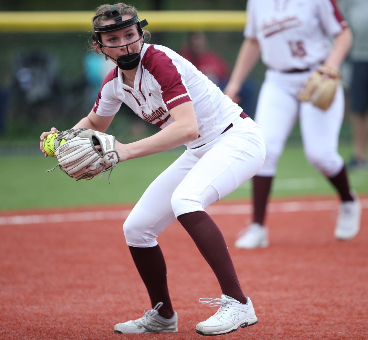 Arlington's Alyssa Liguori fields a bunt from John Jay's Hope Angioletti during Monday's game on April 17, 2023.