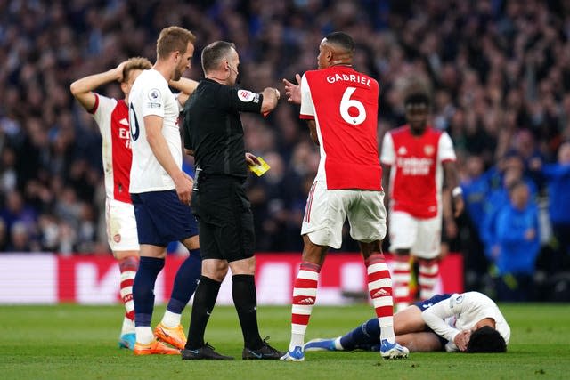 Referee Paul Tierney shows red card Arsenal’s Rob Holding