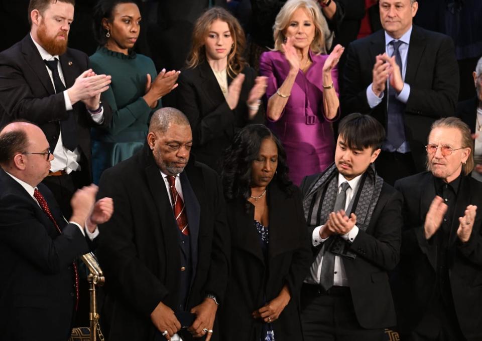 Rodney Wells (2nd L) and RowVaughn Wells (3rd L), parents of Tyre Nichols, are applauded after US President Joe Biden acknowledged them during the State of the Union address in the House Chamber of the US Capitol in Washington, DC, on February 7, 2023. (Photo by Jim WATSON / AFP) (Photo by JIM WATSON/AFP via Getty Images)