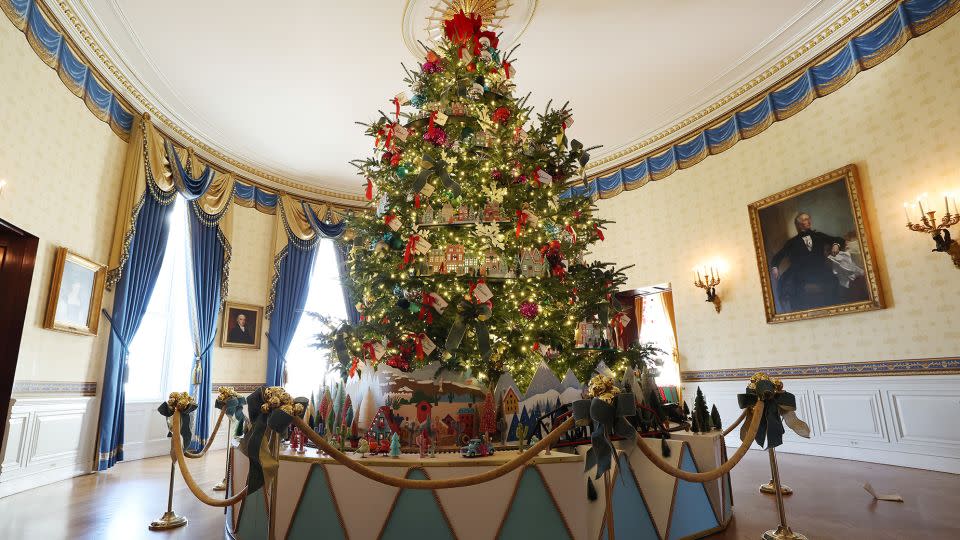 <strong>2023: </strong>Though there are 98 Christmas Trees on the White House premises this year, the official tree has a longstanding tradition of being placed in the Blue Room. - Kevin Dietsch/Getty Images