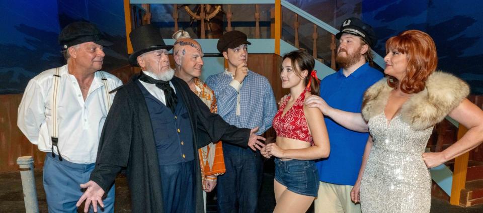 "Ahab," played by Gene Hayes, and members of his crew welcome castaways in the comedy "Moby Dick Fractured," on stage at Surfside Playhouse through July 2, 2023. Visit surfsideplayhouse.com.