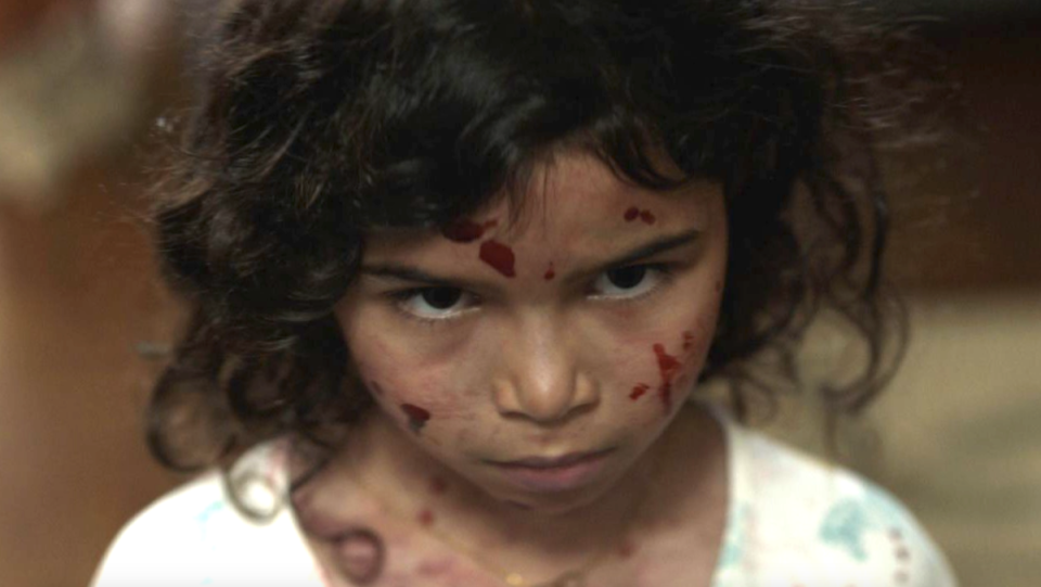 Birth rebirth frankestein retelling image from trailer - little girl covered in blood