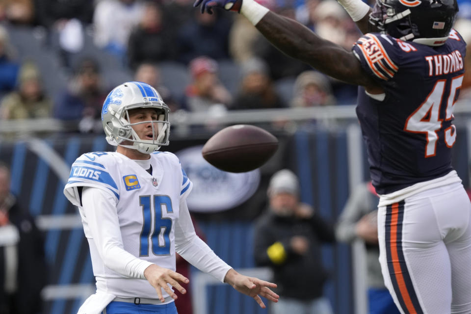 Chicago Bears linebacker Joe Thomas (45) bats down a Detroit Lions quarterback Jared Goff (16) pass during the first half of an NFL football game in Chicago, Sunday, Nov. 13, 2022. (AP Photo/Charles Rex Arbogast)