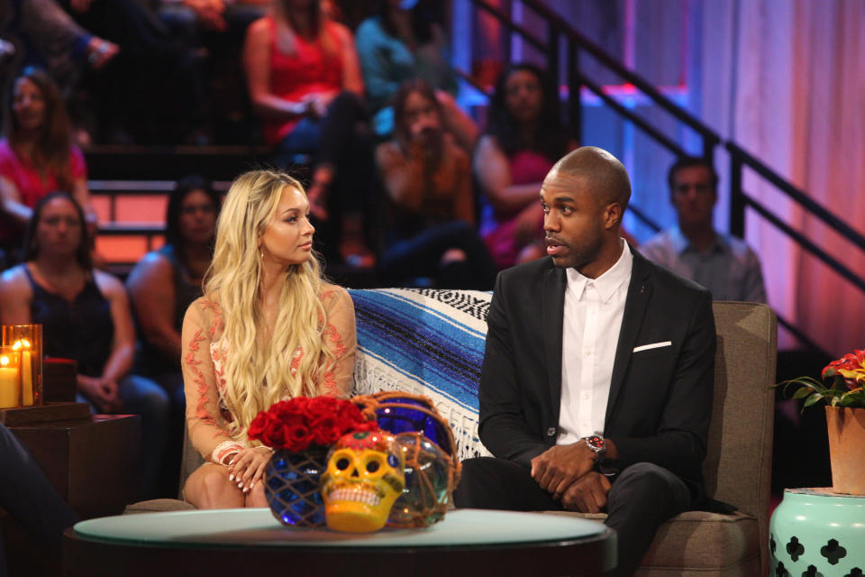 Corinne Olympios and DeMario Jackson talking at the "Bachelor In Paradise" reunion