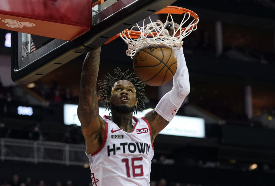 Houston Rockets' Ben McLemore (16) dunks the ball against the Phoenix Suns during the first half of an NBA basketball game Saturday, Dec. 7, 2019, in Houston. (AP Photo/David J. Phillip)