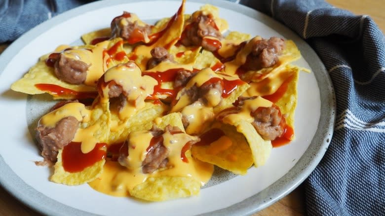 cheesy nachos on plate