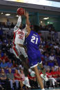 Seton Hall center Ike Obiagu (21) fouls Ohio State forward E.J. Liddell (32) during the second half of an NCAA college basketball game Monday, Nov. 22, 2021, in Fort Myers, Fla. (AP Photo/Scott Audette)