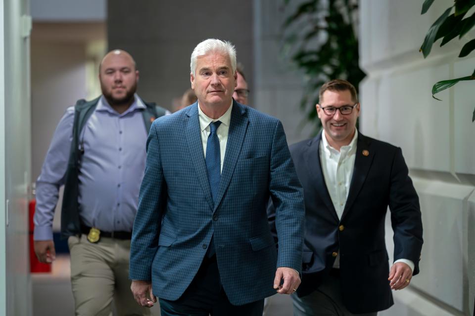 House Majority Whip Tom Emmer, R-Minn., center, and Rep. Guy Reschenthaler, R-Pa., right, the House GOP deputy whip, arrive as GOP members meet behind closed doors to try to elect a new speaker of the House, at the Capitol in Washington, Monday, Oct. 16, 2023. After the rejection of former speaker Kevin McCarthy, Majority Leader Steve Scalise and Judiciary Committee Chair Jim Jordan by the GOP caucus, Emmer is emerging as the newest probable candidate to hold the gavel.
