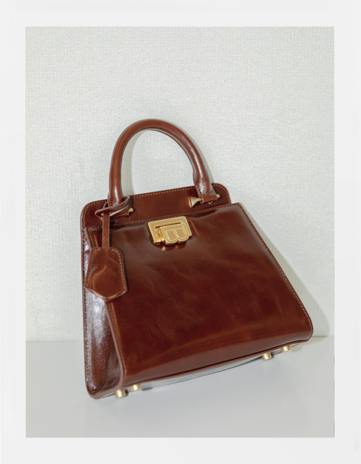 <p><a href="https://brandonblackwood.com/products/jasmine-bag-brown-oil-leather-gold" rel="nofollow noopener" target="_blank" data-ylk="slk:Shop Now;elm:context_link;itc:0;sec:content-canvas" class="link rapid-noclick-resp">Shop Now</a></p><p>Jasmine Bag</p><p>brandonblackwood.com</p>