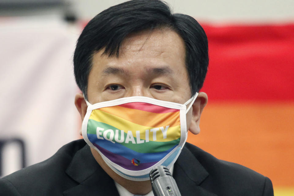 Yukio Edano, head of the main opposition Constitutional of Democratic Party, wearing a rainbow-colored mask with word "Equality" speaks during a meeting of "LGBT Equality Act Japan" in Tokyo, Tuesday, April 27, 2021. Japanese activists, their supporters and lawmakers gathered in person and online at a “Rainbow parliament” event Tuesday as they marked Japan's sexual minority pride week to gain momentum for their push toward an enactment of a LGBTQ equality law before the Olympics. (AP Photo/Koji Sasahara)