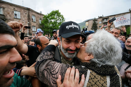 People greet Armenian opposition leader Nikol Pashinyan as he arrives at a rally in the town of Ijevan, Armenia April 28, 2018. REUTERS/Gleb Garanich -