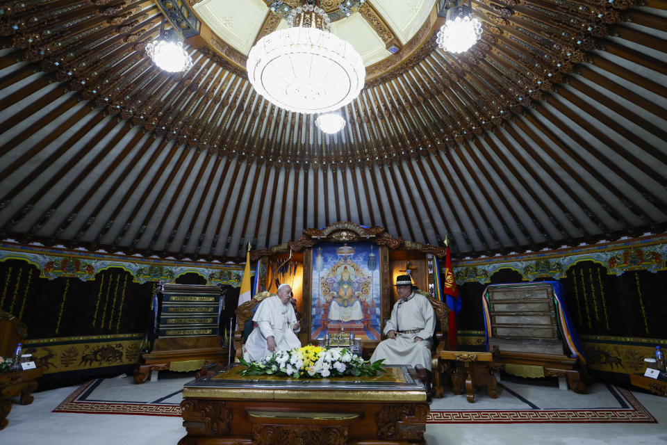 Mongolian President Ukhnaagin Khurelsukh, right, and Pope Francis meet, Saturday, Sept. 2, 2023, at the State Palace in Sukhbaatar Square in Ulaanbaatar. Pope Francis arrived in Mongolia on Friday morning for a four-day visit to encourage one of the world's smallest and newest Catholic communities. (AP Photo/Remo Casilli, pool)