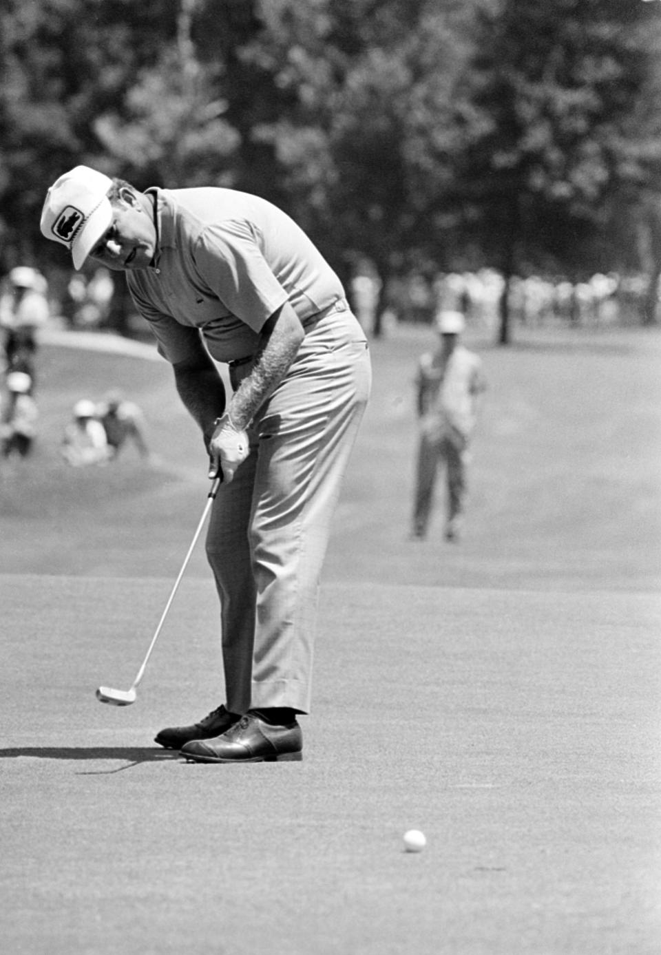 FILE - In this June 15, 1969, file photo, Orville Moody uses his unorthodox, cross-handed method of putting during the final round of the tournament in Houston, Texas (AP Photo/File)