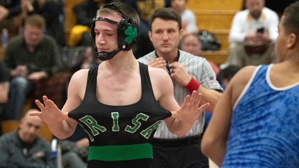 Camden Catholic's Sammy Spaulding celebrates after defeating Donovan Catholic's Dezmond Lenaghan, 6-5, in the 120 lb. championship bout of the Region 7 wrestling tournament at Cherry Hill East High School on Saturday, February 25, 2023.  