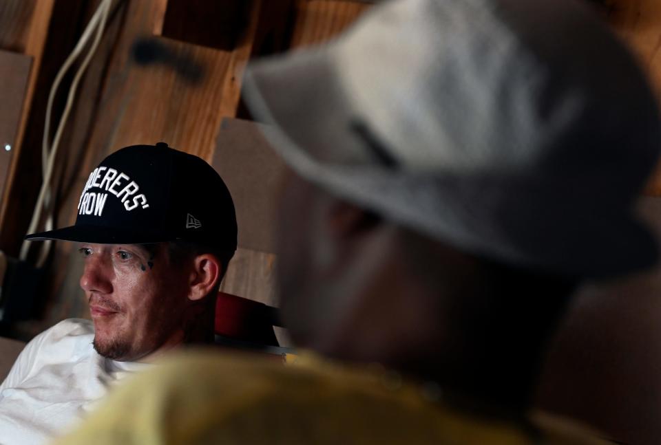 Thomas Gooch, right, talks with Tommy Gordon, 35, in sober living space My Father's House on Wednesday, August 24, 2022, in Nashville, Tenn. There, Gooch serves as a mentor for men coming out of prison who want to reconnect with their children.