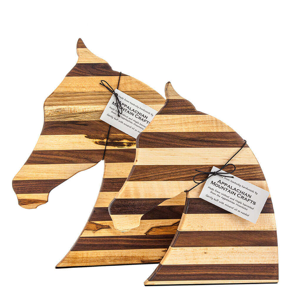 For the foodie in your life, consider the fleur de lis or horse head silhouette cutting board made in Stanton, Kentucky by Appalachian Mountain Crafts. These boards are made from maple and walnut wood harvested from the Appalachian Mountains.