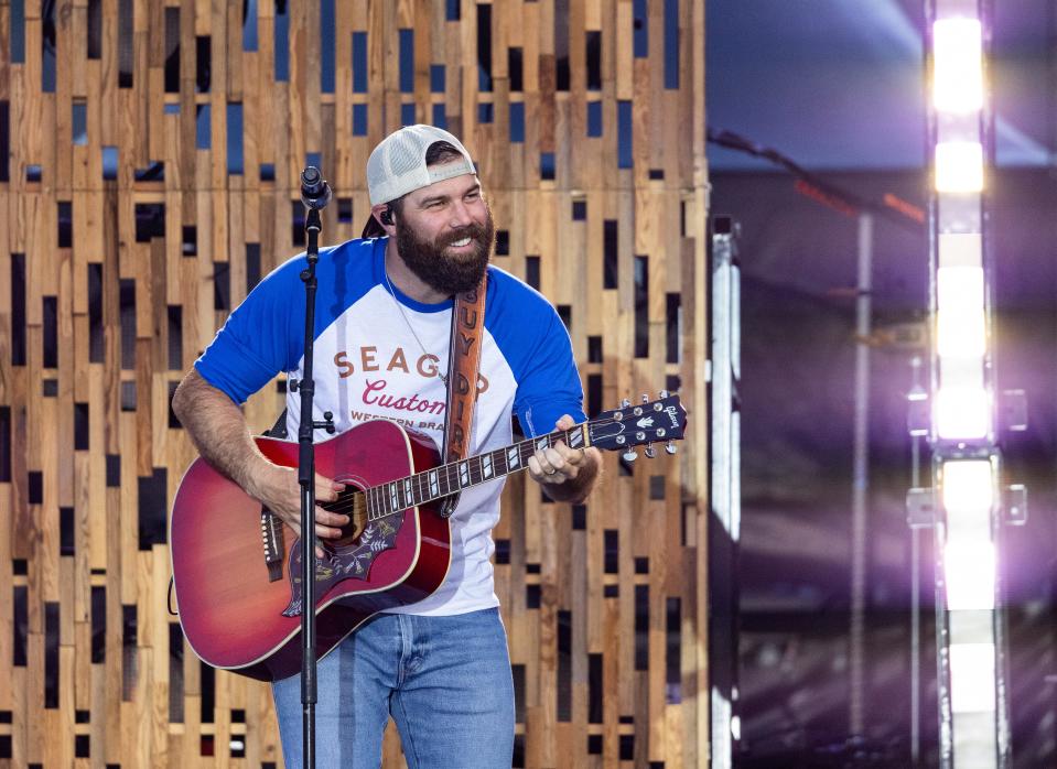 Country music fans flocked to day two at the Gulf Coast Jam at Frank Brown Park in Panama City Beach Friday, June 4. Jordan Davis, shown performing at the event, is scheduled to come to Washington City for a benefit concert later this month.