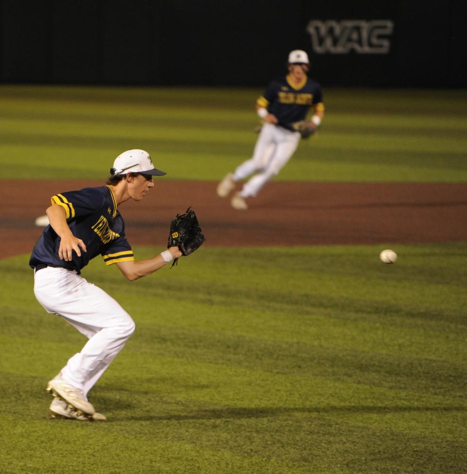 Stephenville's Clayton Easter fields a ball against Snyder.