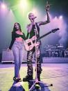 <p>Megan Fox wore a pair of black heels, light-coloured denim jeans and a bralette to join Machine Gun Kelly on stage at the <a href="https://www.elle.com/uk/life-and-culture/culture/a36590177/megan-fox-and-machine-gun-kelly-indy-500-barstool-sports-party/" rel="nofollow noopener" target="_blank" data-ylk="slk:gig;elm:context_link;itc:0;sec:content-canvas" class="link ">gig</a>.</p>