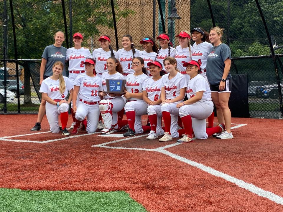 The Weehawken softball poses with the trophy after winning the North 2, Group 1 sectional title on Saturday, June 3, 2023.