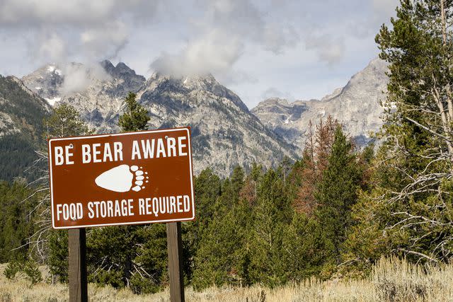 <p>Getty Images</p> 'Be Bear Aware' sign in Yellowstone National Park, Wyoming