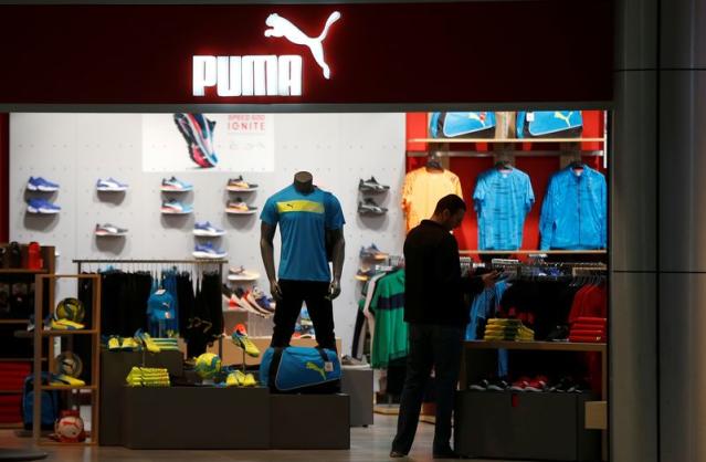 puma brand logo, a sign above the entrance to the company's brand store for  the production of sportswear and accessories. Krasnoyarsk, Russia, May 15  Stock Photo - Alamy