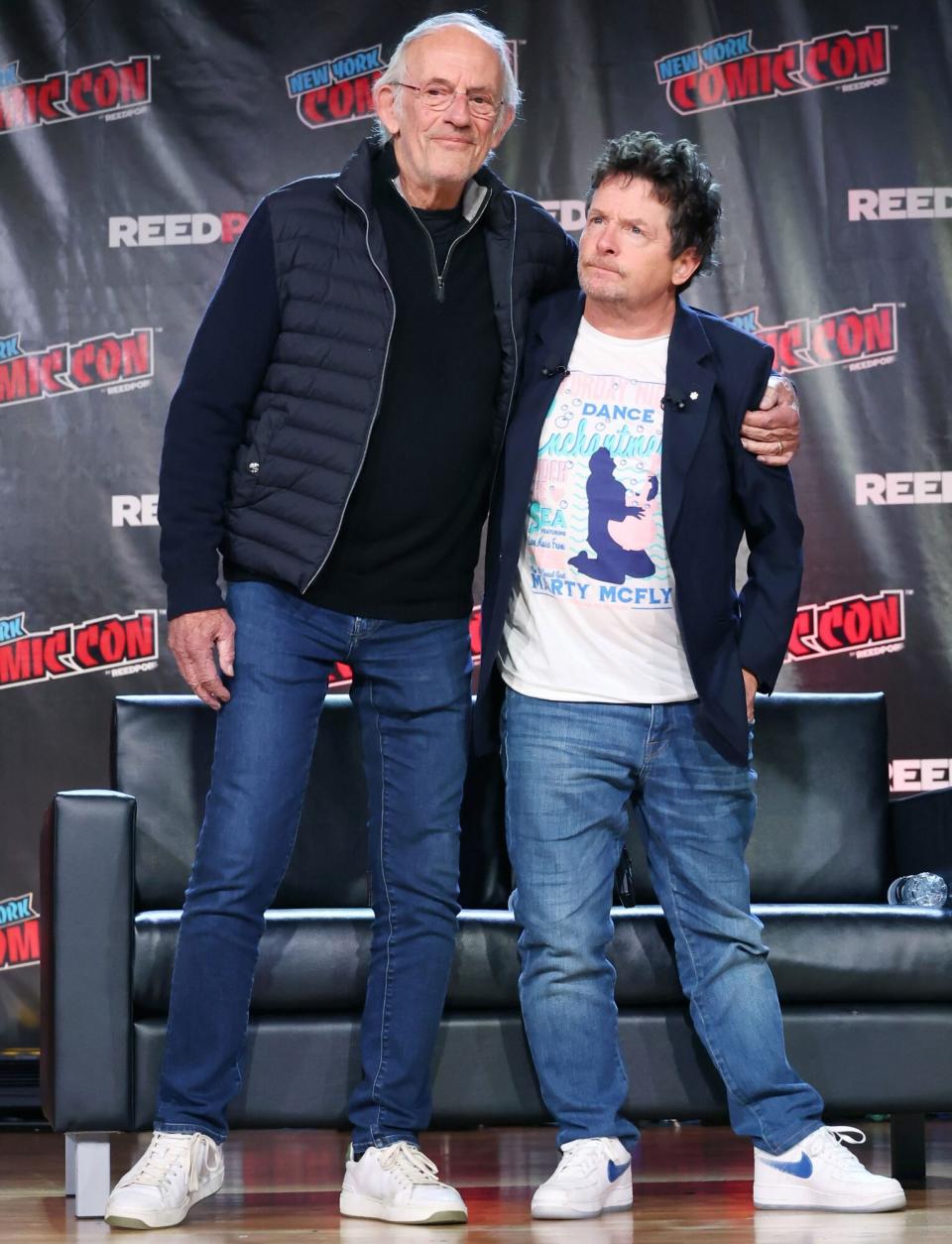 NEW YORK, NEW YORK - OCTOBER 08: Actors Christopher Lloyd (L) and Michael J. Fox attend a "Back To The Future Reunion" at New York Comic Con on October 08, 2022 in New York City. (Photo by Mike Coppola/Getty Images for ReedPop)