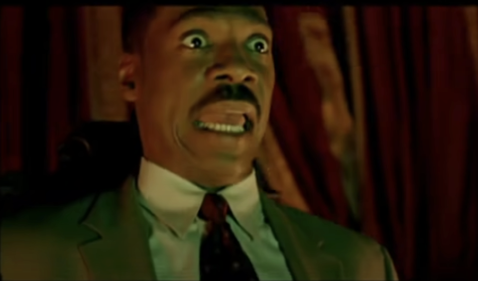 closeup of eddie murphy looking scared