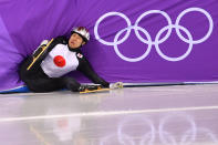 <p>Japan’s Ryosuke Sakazume crashes in the men’s 1,000m short track speed skating heat event during the Pyeongchang 2018 Winter Olympic Games, at the Gangneung Ice Arena in Gangneung on February 13, 2018. / AFP PHOTO / Mladen ANTONOV (Photo credit should read MLADEN ANTONOV/AFP/Getty Images) </p>