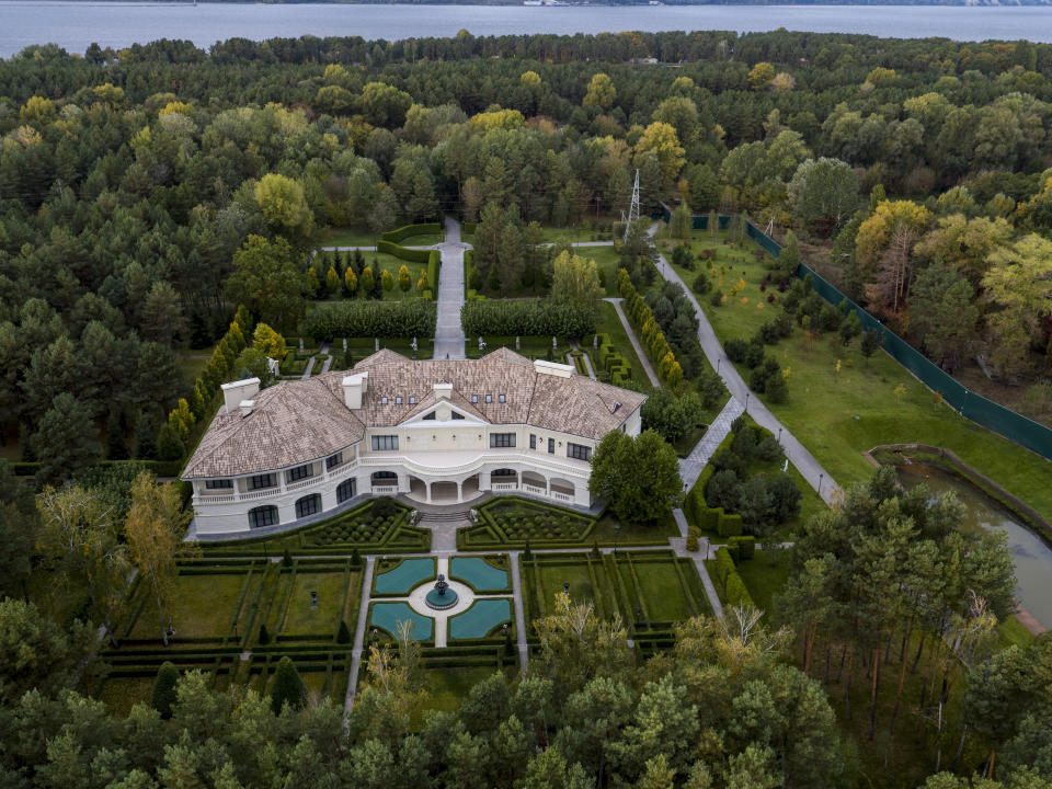 This Oct. 6, 2019, photo shows the house of Mykola Zlochevsky, near Kyiv, Ukraine, owner of the gas company Burisma that hired Hunter Biden in 2014. Ukraine's chief prosecutor has announced a review of past cases against Zlochevsky. (AP Photo/Evgeniy Maloletka)