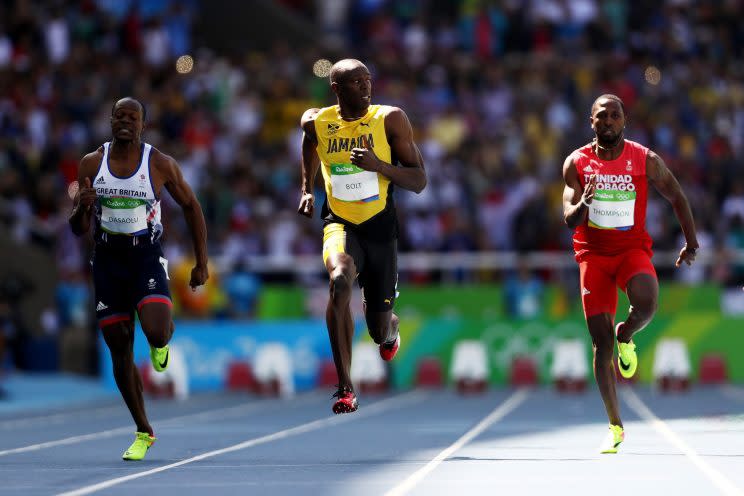 Jamaica’s Usain Bolt, Richard Thompson of Trinidad and Tobago and James Dasaolu of Great Britain compete in the Men’s 100m Round 1. (Getty)