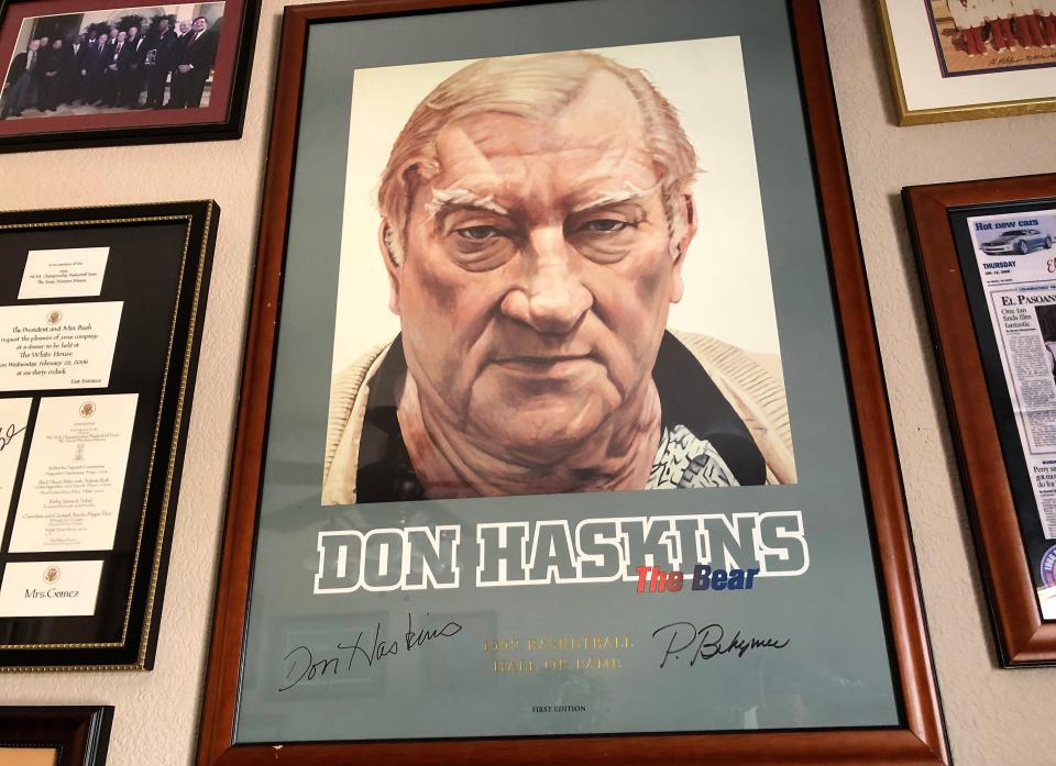 A framed poster featuring a famous portrait of the late UTEP basketball Coach Don Haskins, signed by Haskins and Philip Behymer, the late artist who painted the portrait. Its part of Joe Gomez's collection being sold at his estate sale.