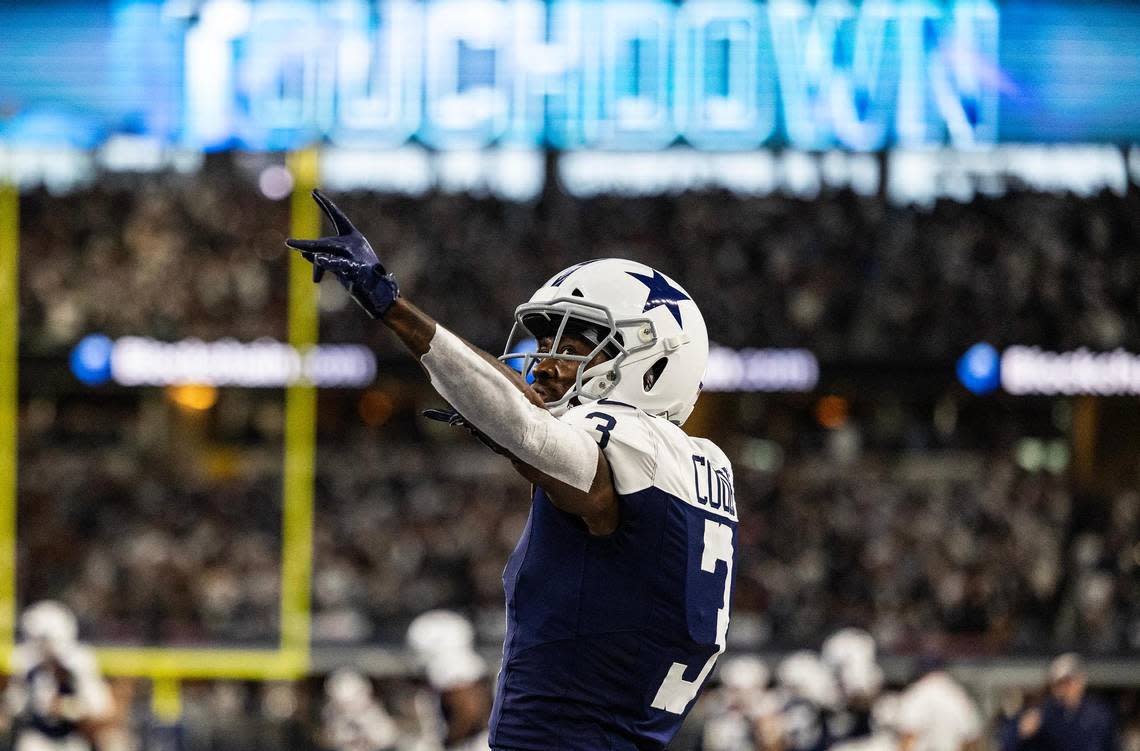 Dallas Cowboys wide receiver Brandin Cooks (3) celebrates after catching the ball for a touchdown in the second quarter during the Thanksgiving NFL game between the Dallas Cowboys and the Washington Commanders at AT&T Stadium in Arlington on Thursday, Nov. 23, 2023.