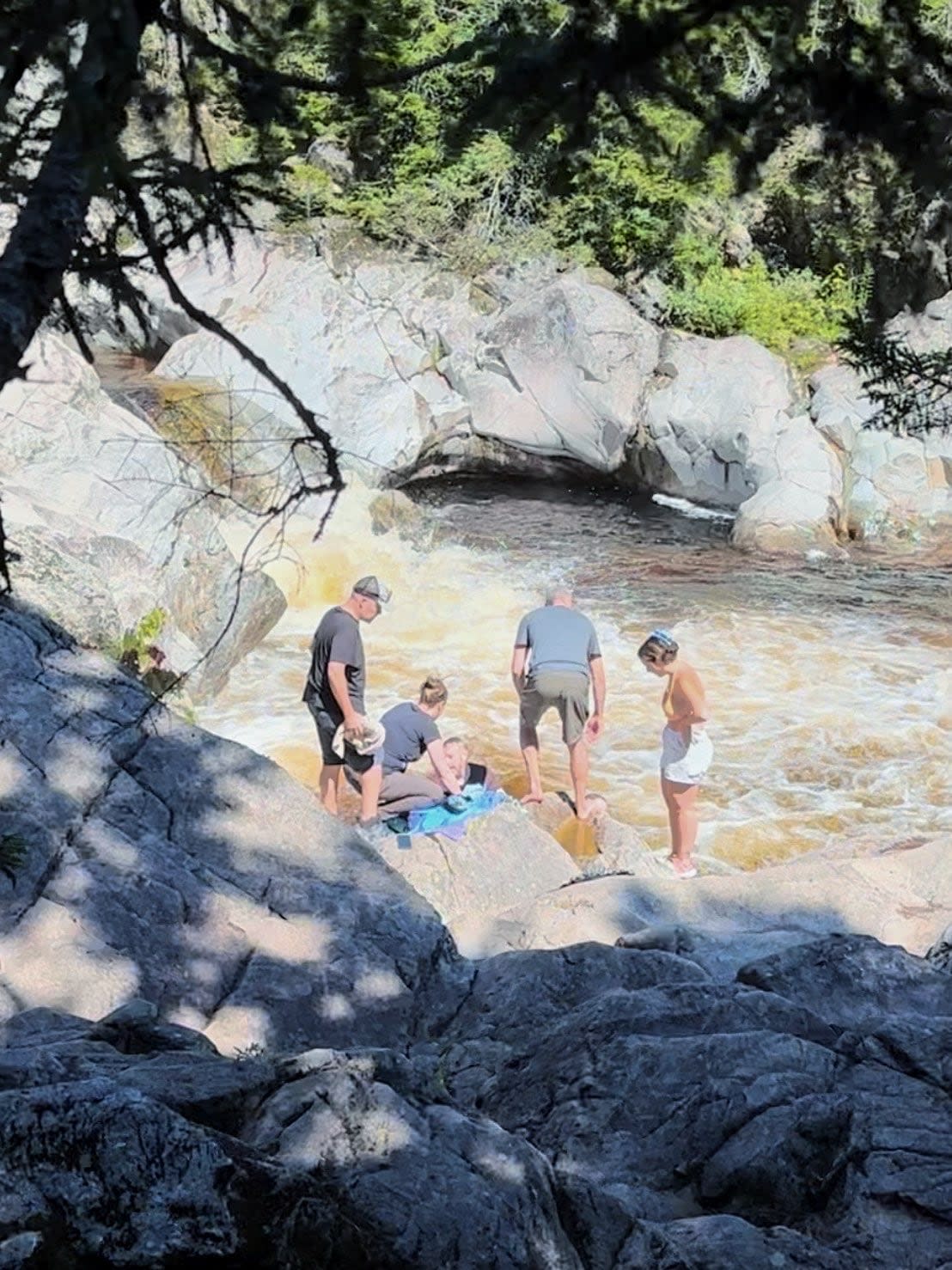 The group of friends spotted the swimmer at the base of a small waterfall along Moosehorn Trail, when their instincts kicked in. (Name withheld by request - image credit)