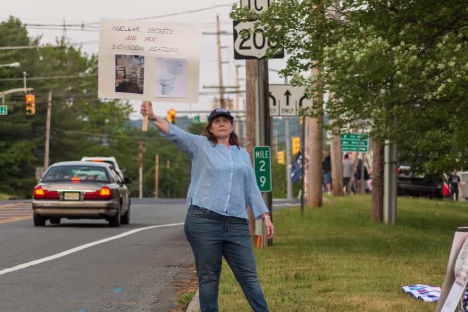 Corinne Simmons, an anti-Trump protestor in Bedminster, feels that most Americans approve of Trump's indictment.