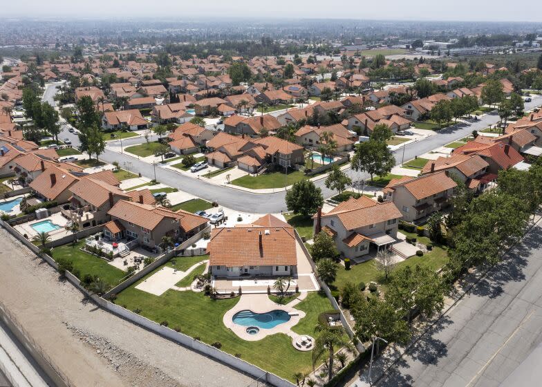 Rancho Cucamonga, CA, Wednesday, April 27, 2022 - A drone image over a housing tract that is part of the state water project, where outdoor watering to one day a week. Water Shortage Emergency to be declared in communities in Los Angeles, San Bernardino and Ventura counties, home to 6 million Southern Californians. These homes are located near the intersection of Wilson and Milliken Avenues. (Robert Gauthier/Los Angeles Times)