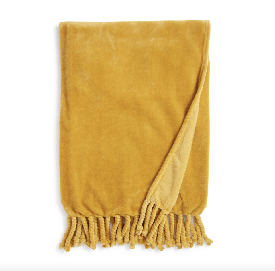 Nordstrom Bliss Plush Throw in Olive Honey (Photo via Nordstrom)