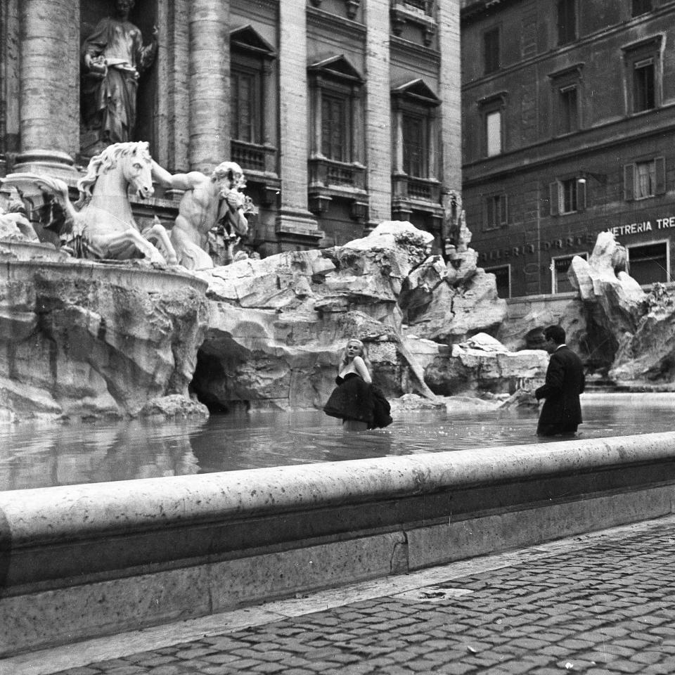 Film set of 'La Dolce Vita' at Trevi Fountain while the actor Marcello Mastroianni and the actress Anita Ekberg take a bath in the 'Trevi fountain', Rome 1959. (Photo by Archivio Cicconi/Getty Images)