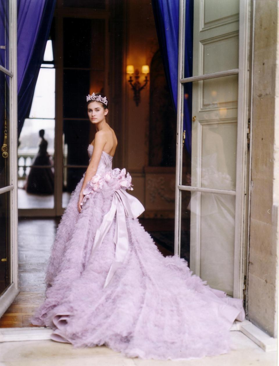 Lauren Bush, niece of former president George W. Bush, poses in a light purple Christian Dior dress in 2000.