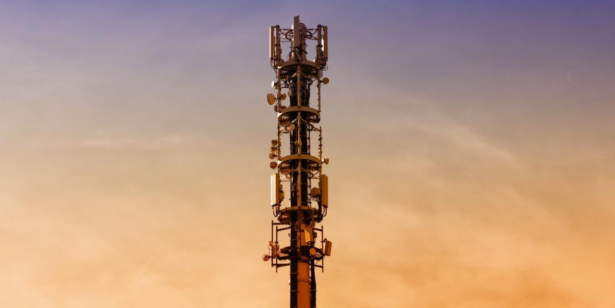 mobile phone antennas at sunset