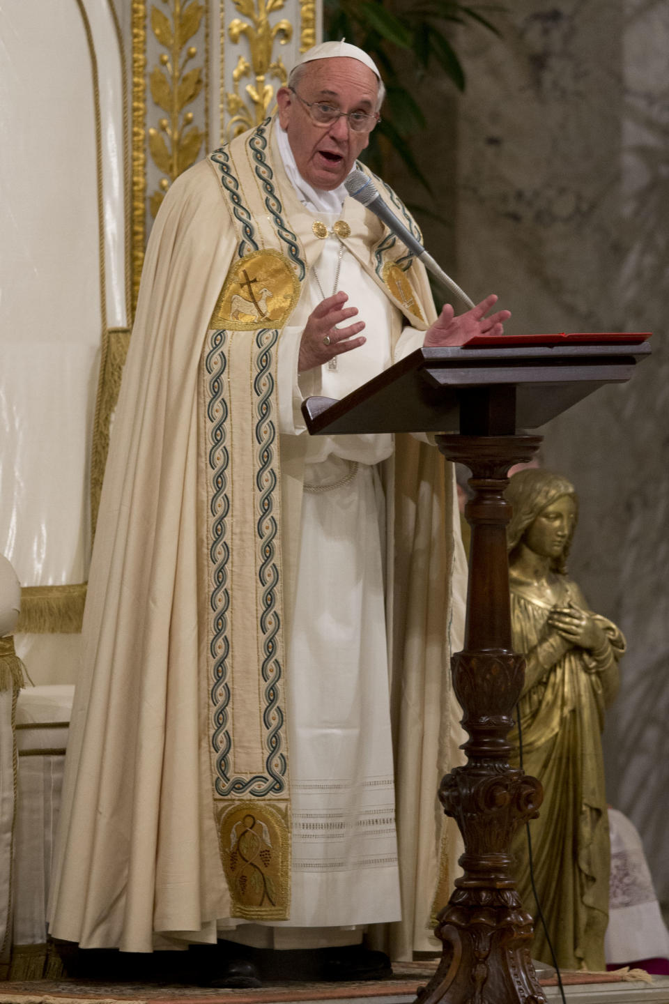 Pope Francis presides over a Vespers ceremony at Rome's St. Paul Basilica, at the Vatican, Saturday, Jan. 25, 2014. (AP Photo/Andrew Medichini)