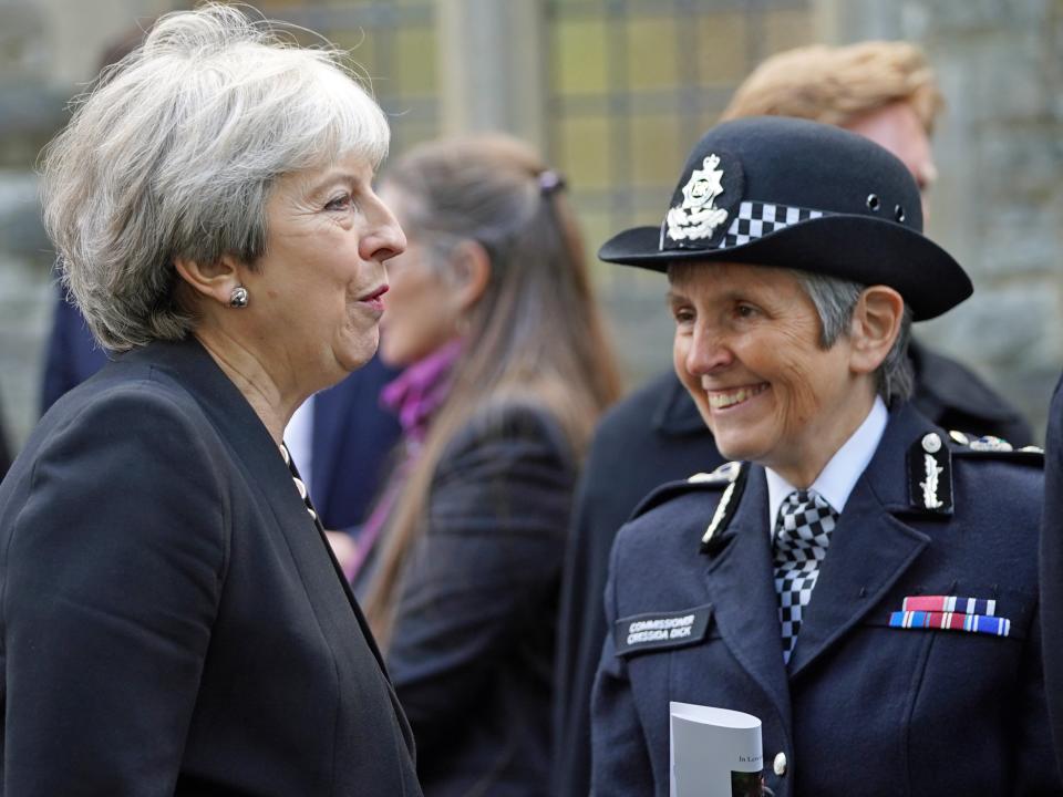 May (left) speaks to Met police commissioner Cressida Dick after the funeral (PA)
