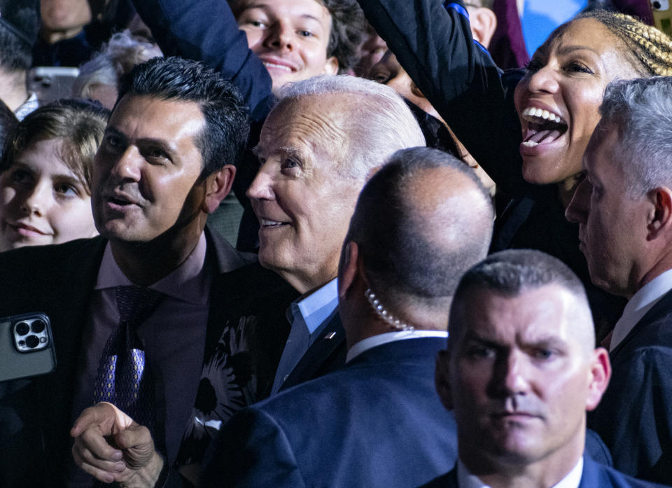 President Joe Biden poses for photos at the end of a campaign event with New York Gov. Kathy Hochul at Sarah Lawrence College in Yonkers, N.Y., Sunday, Nov. 6, 2022. (AP Photo/Craig Ruttle)