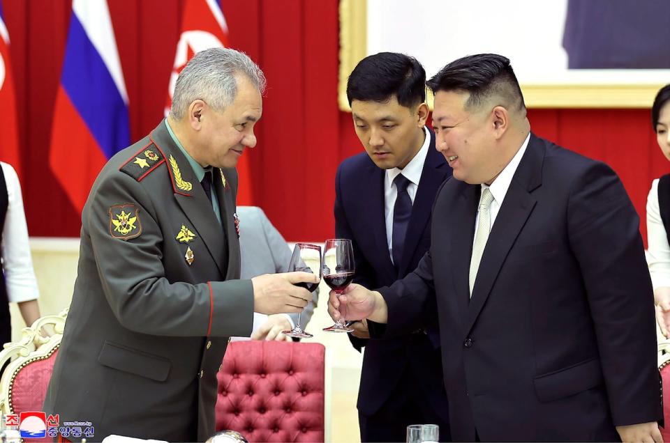 In this photo provided by the North Korean government, North Korean leader Kim Jong Un, right, and Russian Defence Minister Sergei Shoigu, left, toast at a banquet hall of the ruling Workers' Party's headquarters in Pyongyang, North Korea on Thursday, July 27, 2023. Shoigu visited Pyongyang in what the U.S. saw as part of Moscow's efforts to negotiate for supplies of North Korean munitions.