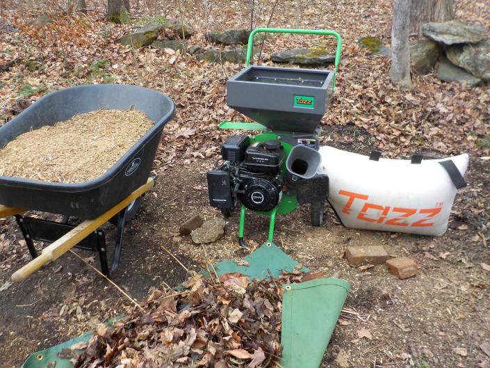 This gas-powered chipper-shredder helps make mulch and compost materials.