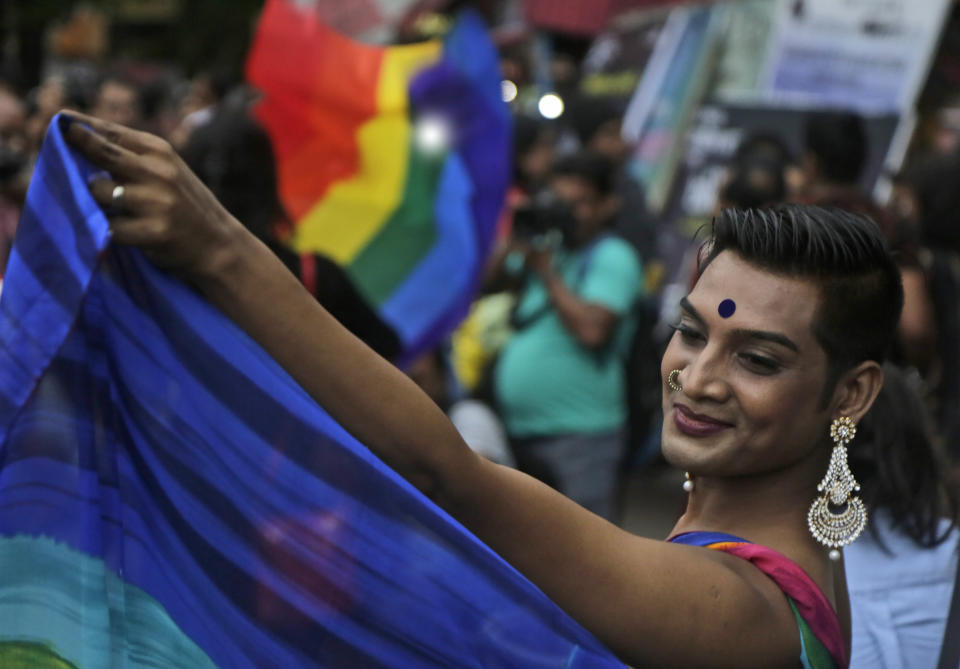 A gay rights activist participates in a rally to commemorate the twentieth anniversary of the first pride parade in the country, in Kolkata, India, Saturday, June 29, 2019. (AP Photo/Bikas Das)