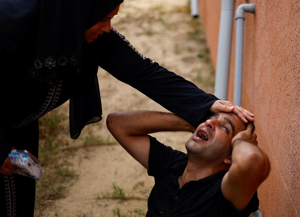 A mourner at a hospital in Khan Younis.